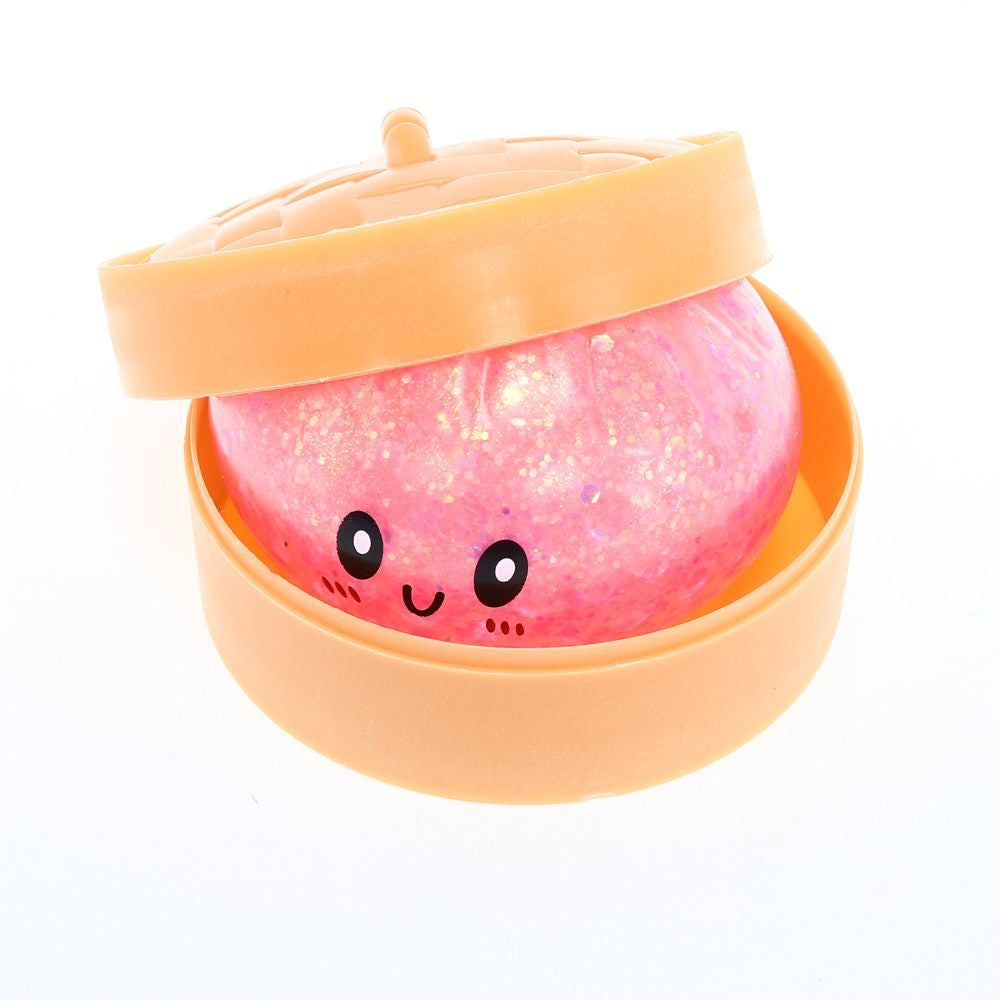 Squishy toy dumpling smiley face glitter